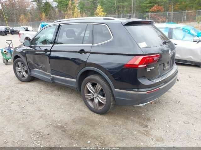 Черный Фольксваген Тигуан, объемом двигателя 2 л и пробегом 67 тыс. км за 5000 $, фото 2 на Automoto.ua