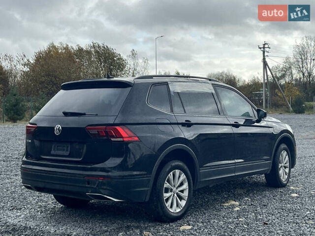 Черный Фольксваген Тигуан, объемом двигателя 2 л и пробегом 160 тыс. км за 12000 $, фото 5 на Automoto.ua