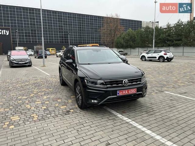 Чорний Фольксваген Тігуан, об'ємом двигуна 2 л та пробігом 124 тис. км за 19500 $, фото 21 на Automoto.ua