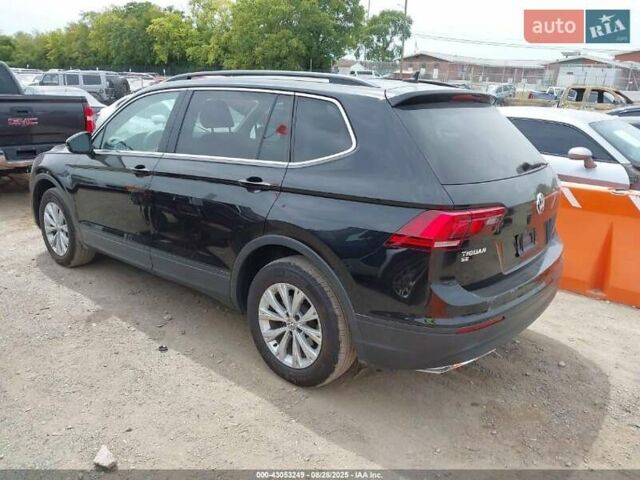 Чорний Фольксваген Тігуан, об'ємом двигуна 2 л та пробігом 187 тис. км за 16000 $, фото 1 на Automoto.ua