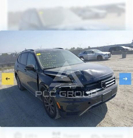 Черный Фольксваген Тигуан, объемом двигателя 2 л и пробегом 129 тыс. км за 19000 $, фото 23 на Automoto.ua