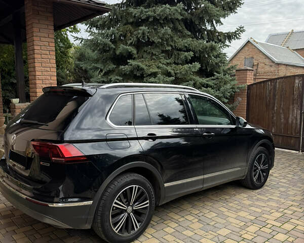 Черный Фольксваген Тигуан, объемом двигателя 1.98 л и пробегом 103 тыс. км за 31000 $, фото 23 на Automoto.ua