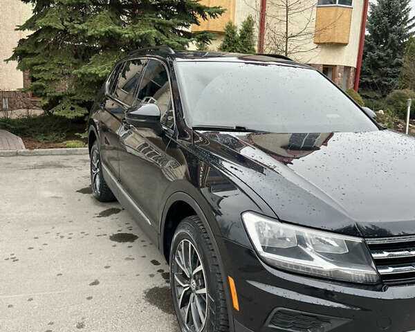 Черный Фольксваген Тигуан, объемом двигателя 2 л и пробегом 130 тыс. км за 18500 $, фото 1 на Automoto.ua