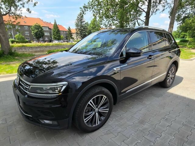 Чорний Фольксваген Тігуан, об'ємом двигуна 2 л та пробігом 41 тис. км за 13200 $, фото 2 на Automoto.ua