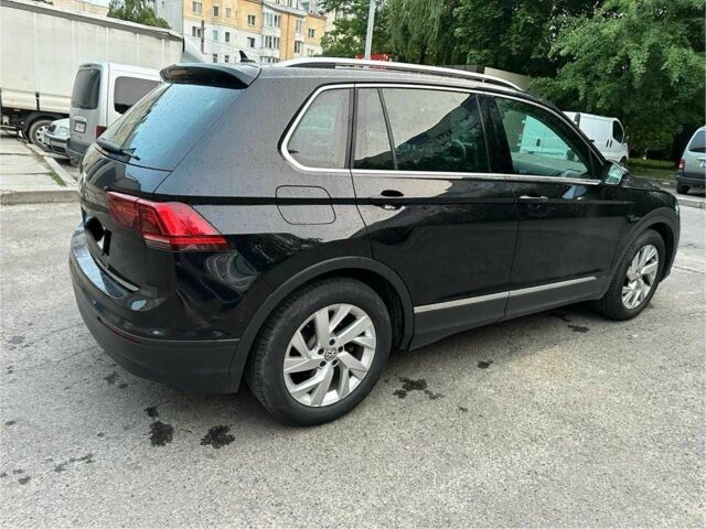 Черный Фольксваген Тигуан, объемом двигателя 2 л и пробегом 175 тыс. км за 23211 $, фото 4 на Automoto.ua