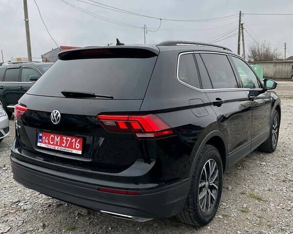 Черный Фольксваген Тигуан, объемом двигателя 2 л и пробегом 183 тыс. км за 19600 $, фото 4 на Automoto.ua