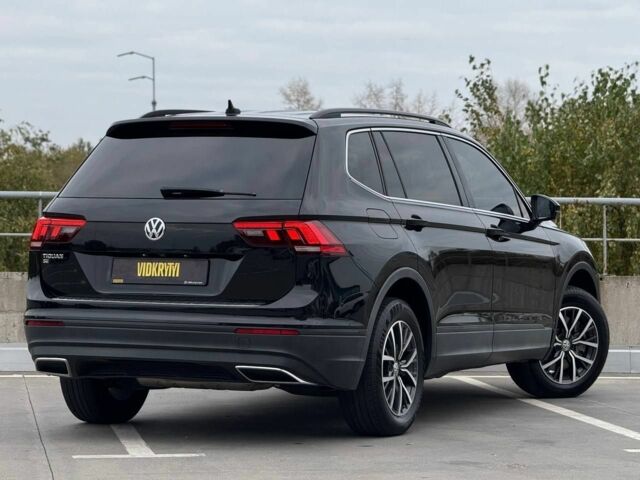 Чорний Фольксваген Тігуан, об'ємом двигуна 2 л та пробігом 117 тис. км за 19650 $, фото 7 на Automoto.ua