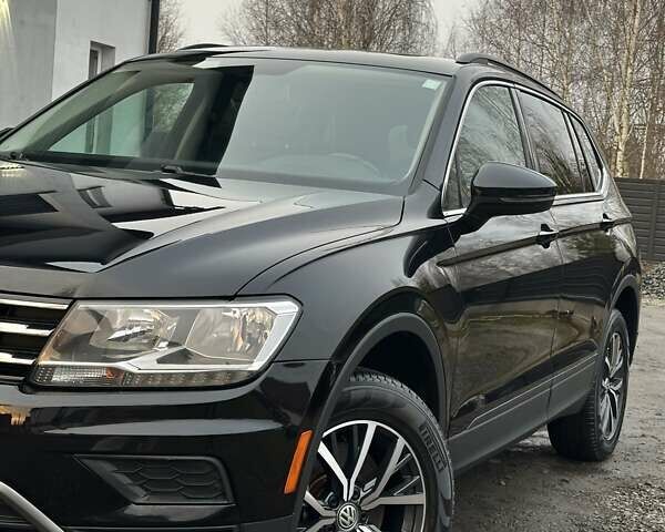 Чорний Фольксваген Тігуан, об'ємом двигуна 2 л та пробігом 200 тис. км за 15900 $, фото 6 на Automoto.ua