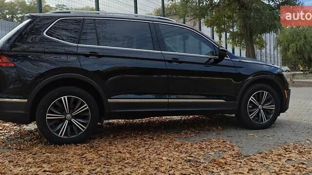 Чорний Фольксваген Тігуан, об'ємом двигуна 1.98 л та пробігом 314 тис. км за 15200 $, фото 23 на Automoto.ua
