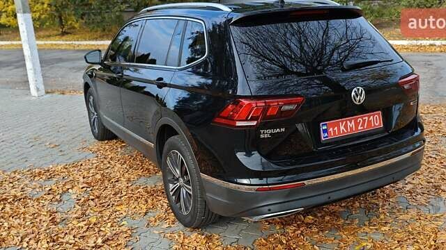 Чорний Фольксваген Тігуан, об'ємом двигуна 1.98 л та пробігом 314 тис. км за 15200 $, фото 10 на Automoto.ua