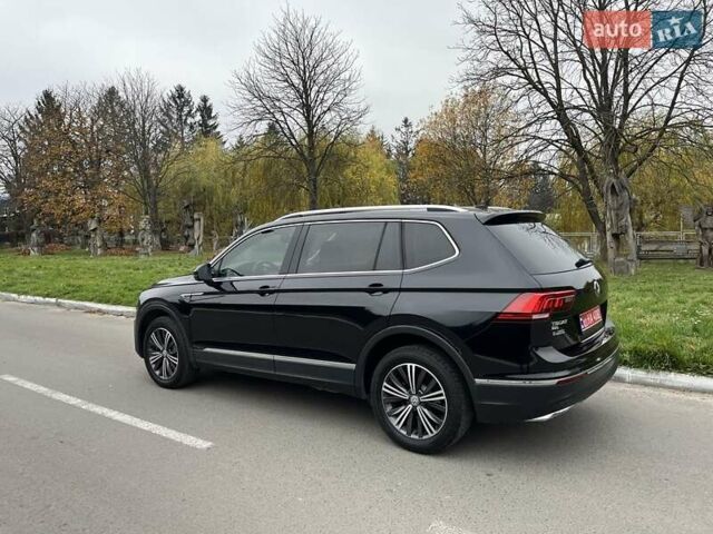 Чорний Фольксваген Тігуан, об'ємом двигуна 2 л та пробігом 124 тис. км за 19500 $, фото 72 на Automoto.ua