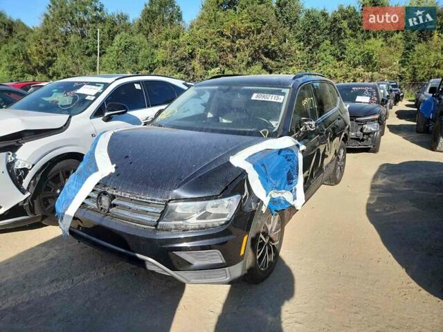 Черный Фольксваген Тигуан, объемом двигателя 2 л и пробегом 138 тыс. км за 12490 $, фото 23 на Automoto.ua