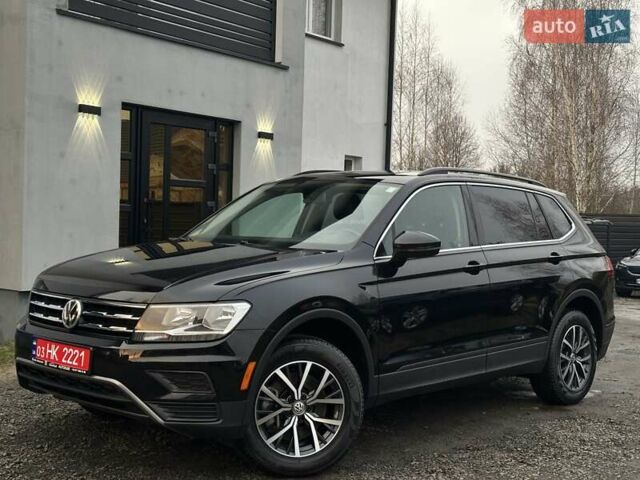 Чорний Фольксваген Тігуан, об'ємом двигуна 2 л та пробігом 200 тис. км за 15900 $, фото 2 на Automoto.ua