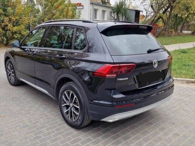 Черный Фольксваген Тигуан, объемом двигателя 2 л и пробегом 103 тыс. км за 15000 $, фото 2 на Automoto.ua
