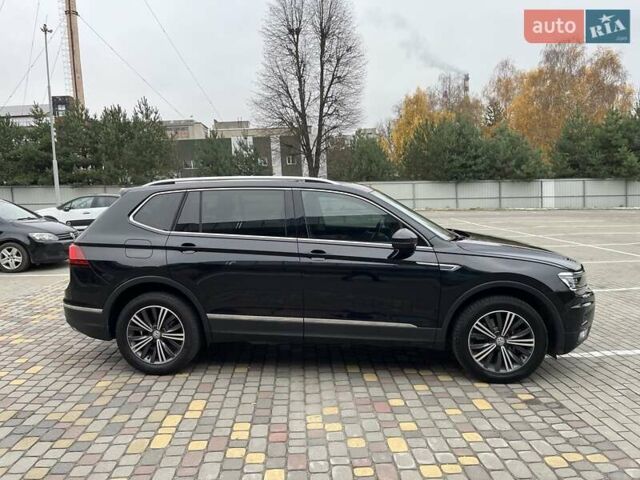 Чорний Фольксваген Тігуан, об'ємом двигуна 2 л та пробігом 124 тис. км за 19500 $, фото 16 на Automoto.ua