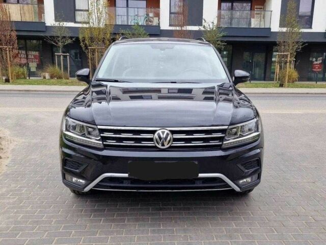 Черный Фольксваген Тигуан, объемом двигателя 2 л и пробегом 103 тыс. км за 15000 $, фото 1 на Automoto.ua