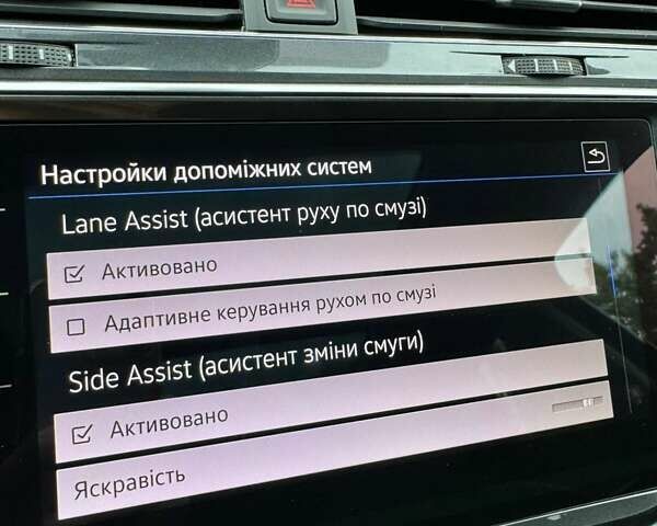 Чорний Фольксваген Тігуан, об'ємом двигуна 2 л та пробігом 223 тис. км за 27799 $, фото 42 на Automoto.ua