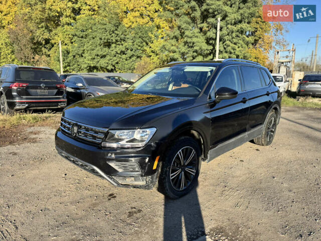 Черный Фольксваген Тигуан, объемом двигателя 2 л и пробегом 133 тыс. км за 11900 $, фото 14 на Automoto.ua