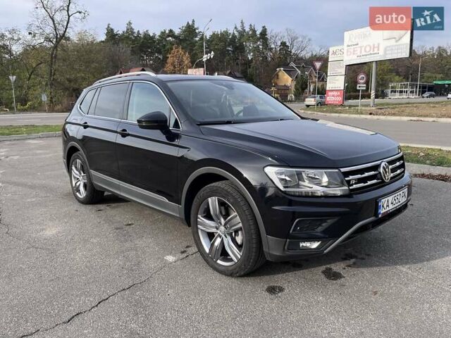 Черный Фольксваген Тигуан, объемом двигателя 2 л и пробегом 66 тыс. км за 24000 $, фото 2 на Automoto.ua
