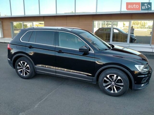 Чорний Фольксваген Тігуан, об'ємом двигуна 1.97 л та пробігом 197 тис. км за 23000 $, фото 1 на Automoto.ua