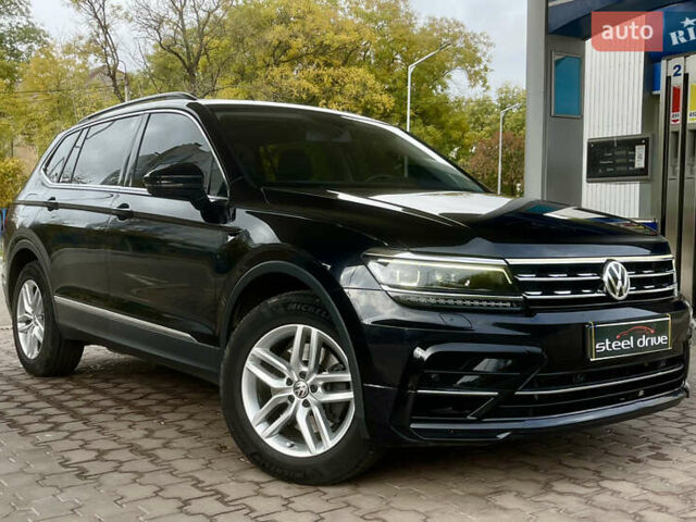 Черный Фольксваген Тигуан, объемом двигателя 1.98 л и пробегом 170 тыс. км за 22499 $, фото 2 на Automoto.ua