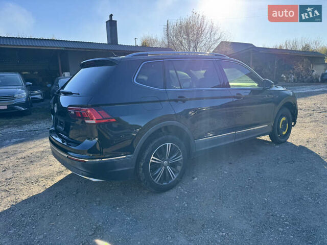 Черный Фольксваген Тигуан, объемом двигателя 2 л и пробегом 133 тыс. км за 11900 $, фото 7 на Automoto.ua