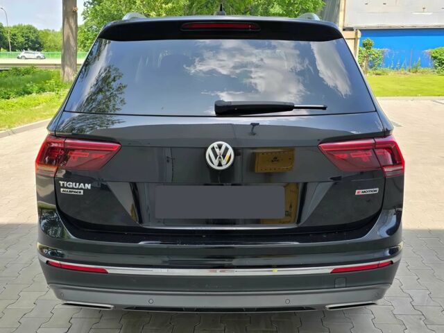 Чорний Фольксваген Тігуан, об'ємом двигуна 2 л та пробігом 41 тис. км за 13200 $, фото 5 на Automoto.ua