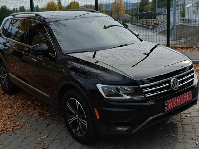 Черный Фольксваген Тигуан, объемом двигателя 2 л и пробегом 314 тыс. км за 14700 $, фото 9 на Automoto.ua