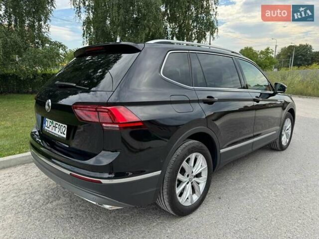 Чорний Фольксваген Тігуан, об'ємом двигуна 2 л та пробігом 223 тис. км за 27799 $, фото 12 на Automoto.ua