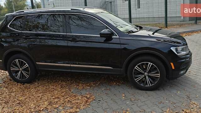 Чорний Фольксваген Тігуан, об'ємом двигуна 1.98 л та пробігом 314 тис. км за 15200 $, фото 9 на Automoto.ua