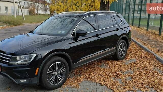 Чорний Фольксваген Тігуан, об'ємом двигуна 1.98 л та пробігом 314 тис. км за 15200 $, фото 3 на Automoto.ua