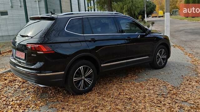Чорний Фольксваген Тігуан, об'ємом двигуна 1.98 л та пробігом 314 тис. км за 15200 $, фото 14 на Automoto.ua