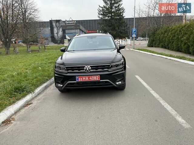 Чорний Фольксваген Тігуан, об'ємом двигуна 2 л та пробігом 124 тис. км за 19500 $, фото 93 на Automoto.ua