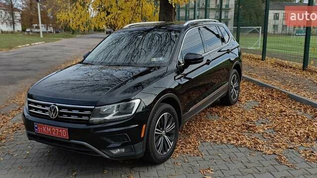 Чорний Фольксваген Тігуан, об'ємом двигуна 1.98 л та пробігом 314 тис. км за 15200 $, фото 2 на Automoto.ua