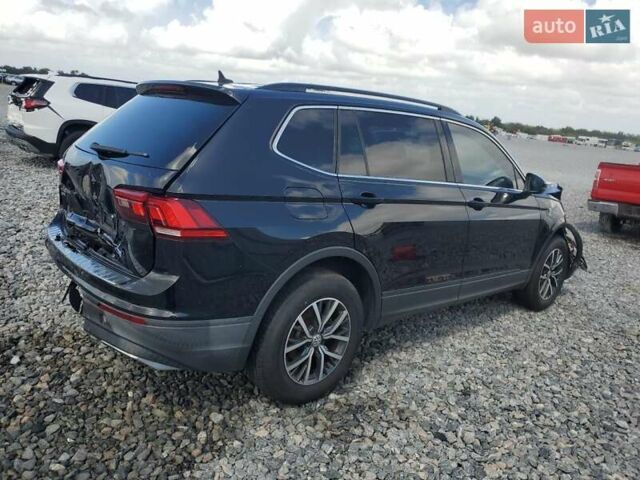 Черный Фольксваген Тигуан, объемом двигателя 2 л и пробегом 138 тыс. км за 12490 $, фото 2 на Automoto.ua