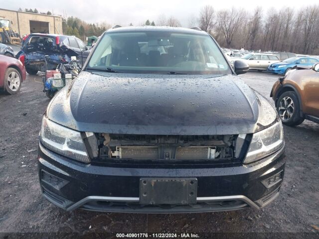 Чорний Фольксваген Тігуан, об'ємом двигуна 2 л та пробігом 115 тис. км за 10100 $, фото 1 на Automoto.ua