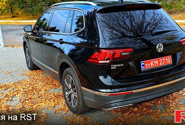 Черный Фольксваген Тигуан, объемом двигателя 2 л и пробегом 314 тыс. км за 15200 $, фото 2 на Automoto.ua