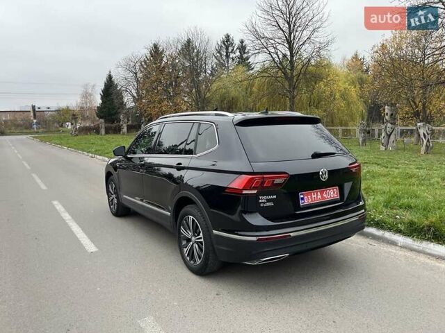 Чорний Фольксваген Тігуан, об'ємом двигуна 2 л та пробігом 124 тис. км за 19500 $, фото 77 на Automoto.ua