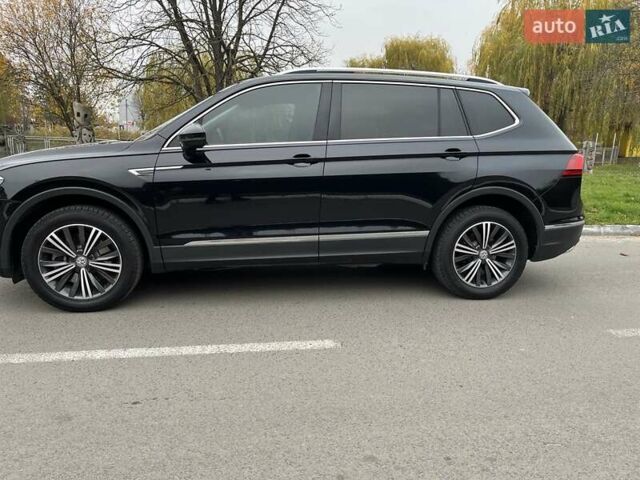 Чорний Фольксваген Тігуан, об'ємом двигуна 2 л та пробігом 124 тис. км за 19500 $, фото 98 на Automoto.ua