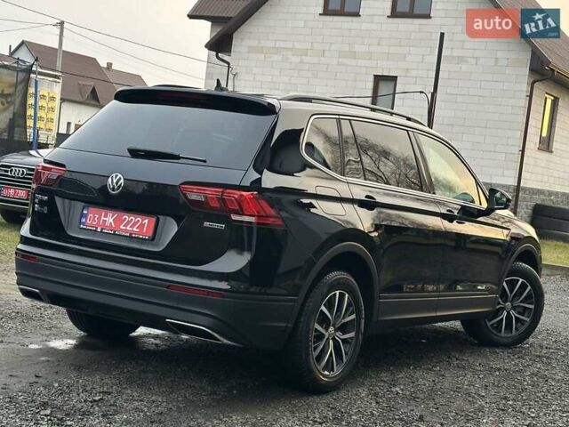 Чорний Фольксваген Тігуан, об'ємом двигуна 2 л та пробігом 200 тис. км за 15900 $, фото 4 на Automoto.ua