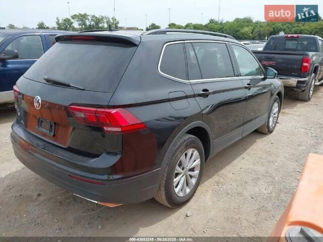 Чорний Фольксваген Тігуан, об'ємом двигуна 2 л та пробігом 187 тис. км за 16000 $, фото 2 на Automoto.ua