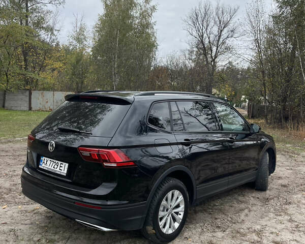 Черный Фольксваген Тигуан, объемом двигателя 1.98 л и пробегом 129 тыс. км за 18500 $, фото 4 на Automoto.ua