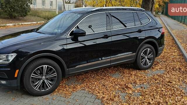 Чорний Фольксваген Тігуан, об'ємом двигуна 1.98 л та пробігом 314 тис. км за 15200 $, фото 4 на Automoto.ua