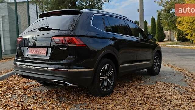 Чорний Фольксваген Тігуан, об'ємом двигуна 1.98 л та пробігом 314 тис. км за 15200 $, фото 12 на Automoto.ua