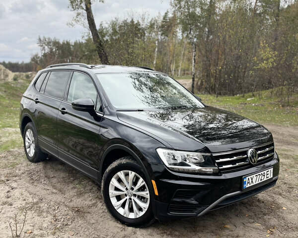 Черный Фольксваген Тигуан, объемом двигателя 1.98 л и пробегом 129 тыс. км за 18500 $, фото 1 на Automoto.ua