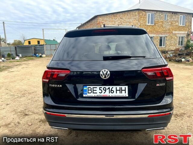 Черный Фольксваген Тигуан, объемом двигателя 2 л и пробегом 170 тыс. км за 21500 $, фото 5 на Automoto.ua