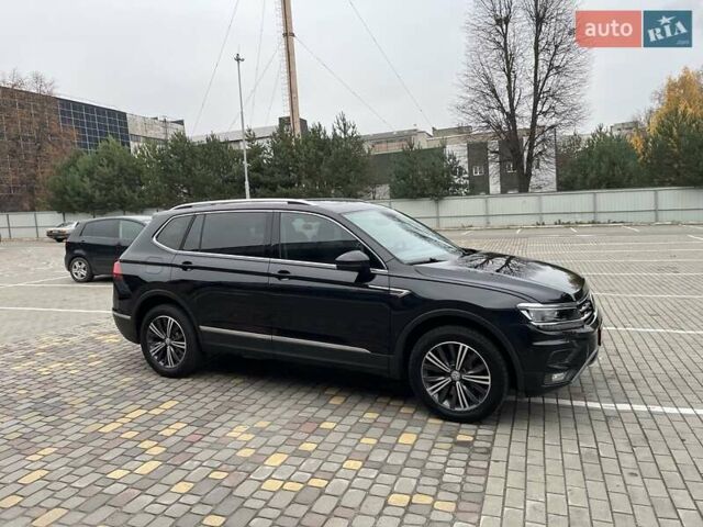 Чорний Фольксваген Тігуан, об'ємом двигуна 2 л та пробігом 124 тис. км за 19500 $, фото 19 на Automoto.ua