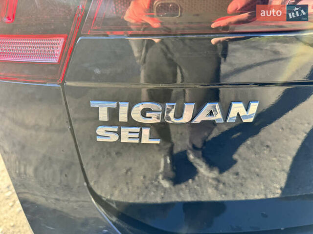 Черный Фольксваген Тигуан, объемом двигателя 2 л и пробегом 133 тыс. км за 11900 $, фото 18 на Automoto.ua