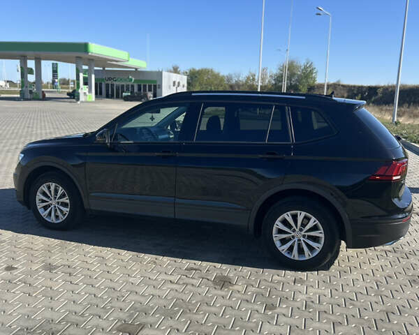 Чорний Фольксваген Тігуан, об'ємом двигуна 2 л та пробігом 76 тис. км за 18900 $, фото 7 на Automoto.ua