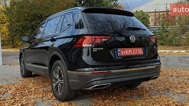 Чорний Фольксваген Тігуан, об'ємом двигуна 1.98 л та пробігом 314 тис. км за 15200 $, фото 11 на Automoto.ua